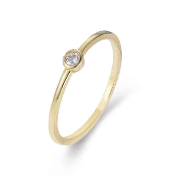 A gold ring with a diamond