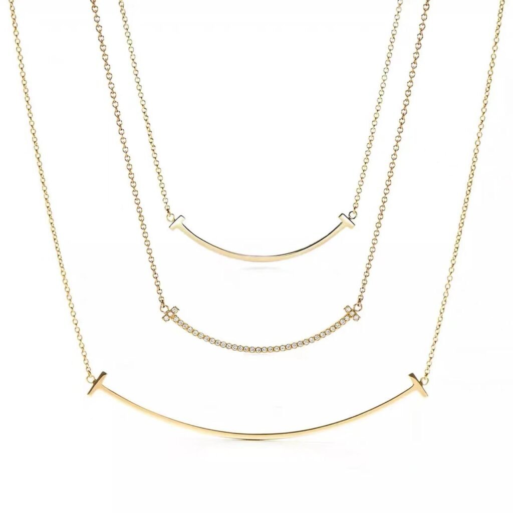 18 karat gold smiley diamond necklace image